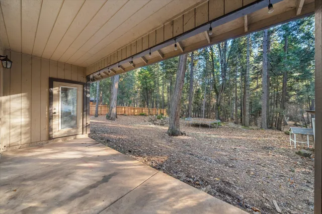 a view of backyard with green space
