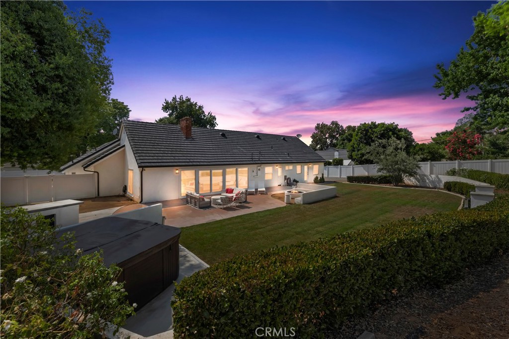 7398 Whitegate Avenue Riverside, CA 92506 - Photo 2 of 51 a view of a house with a yard