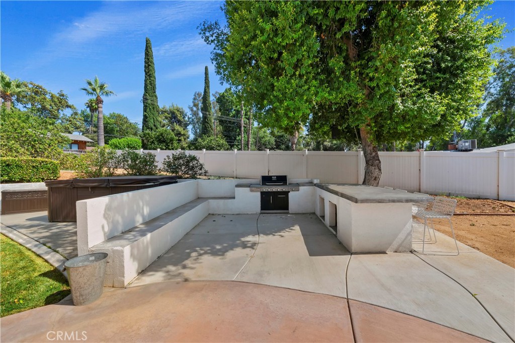 7398 Whitegate Avenue Riverside, CA 92506 - Photo 35 of 51 a view of a patio with couches and potted plants
