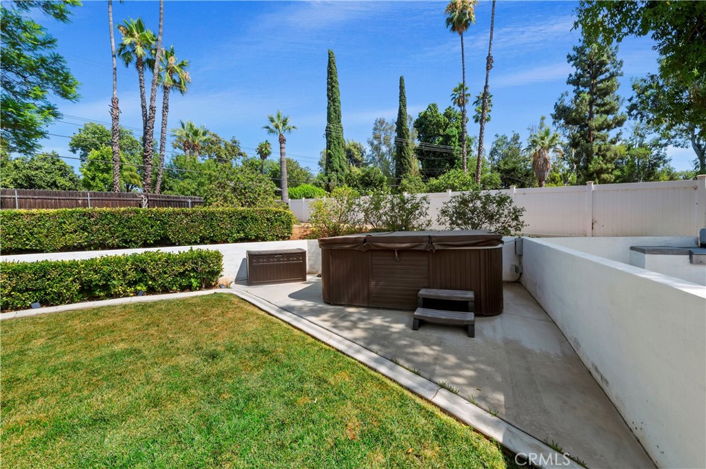 7398 Whitegate Avenue Riverside, CA 92506 - Photo 36 of 51 a view of a terrace with a table and chairs