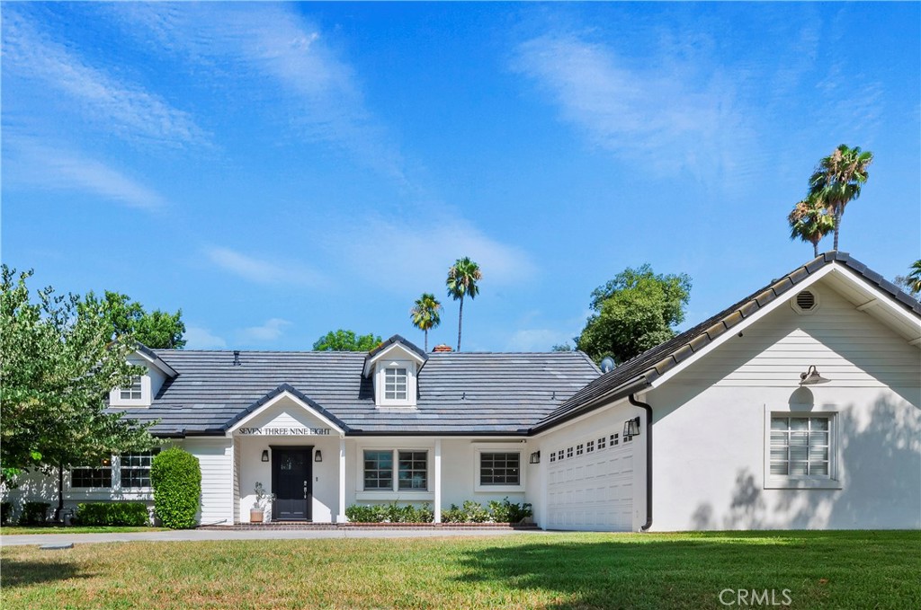 7398 Whitegate Avenue Riverside, CA 92506 - Photo 4 of 51 a view of house with garden space and swimming pool