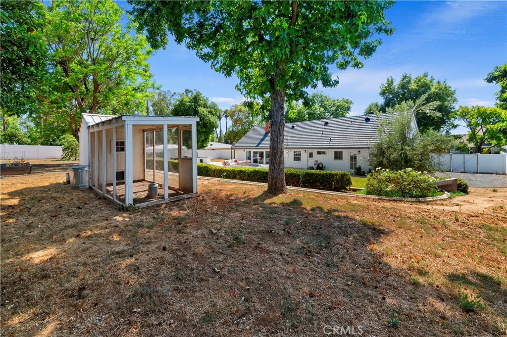7398 Whitegate Avenue Riverside, CA 92506 - Photo 43 of 51 a view of a house with a yard