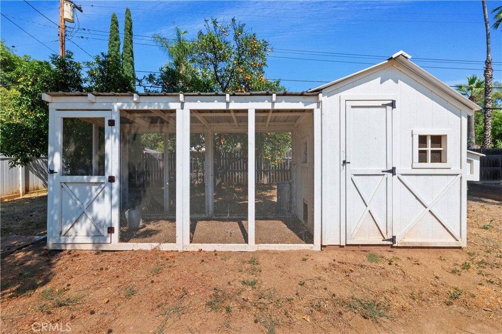 7398 Whitegate Avenue Riverside, CA 92506 - Photo 46 of 51 front view of a house with a yard