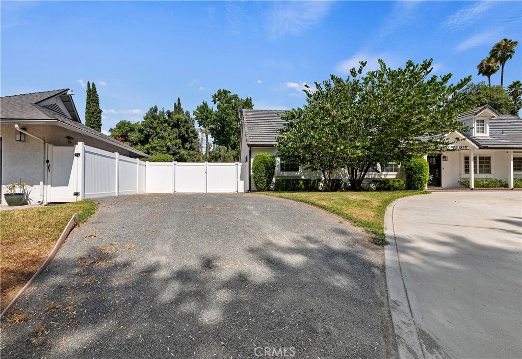 7398 Whitegate Avenue Riverside, CA 92506 - Photo 51 of 51 a view of a house with a yard