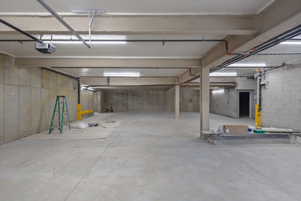 41 University Road, Unit 2 Brookline, MA 02445 - Photo 31 of 33 a view of a room with gym equipment