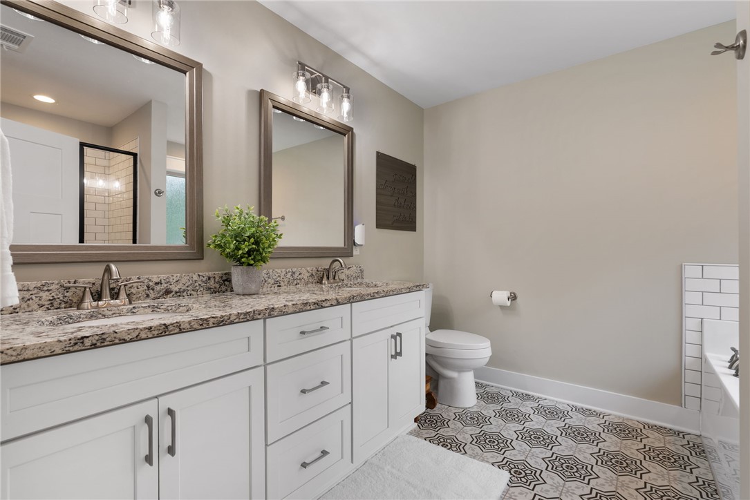 201 Hearthstone Drive Anderson, SC 29621 - Photo 30 of 49 Granite counters and dual sinks define this stylish bathroom, offering both form and function.