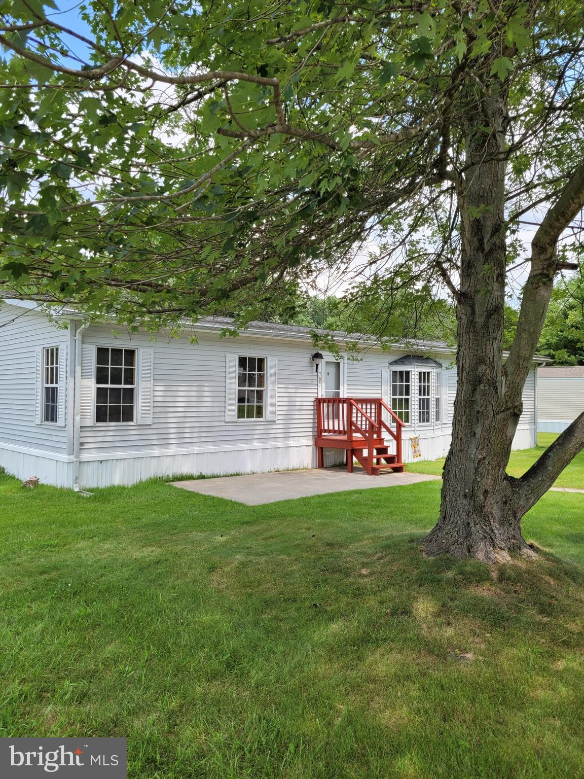 707 Cleaver Farm Road, Unit 707 Middletown, DE 19709 - Photo 14 of 15 a front view of a house with garden
