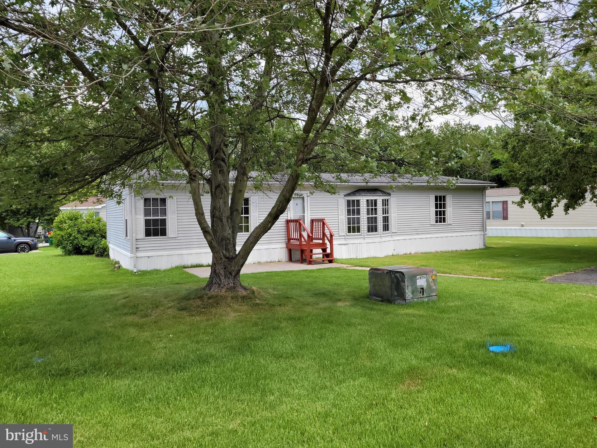 707 Cleaver Farm Road, Unit 707 Middletown, DE 19709 - Photo 2 of 15 a front view of house with yard and green space
