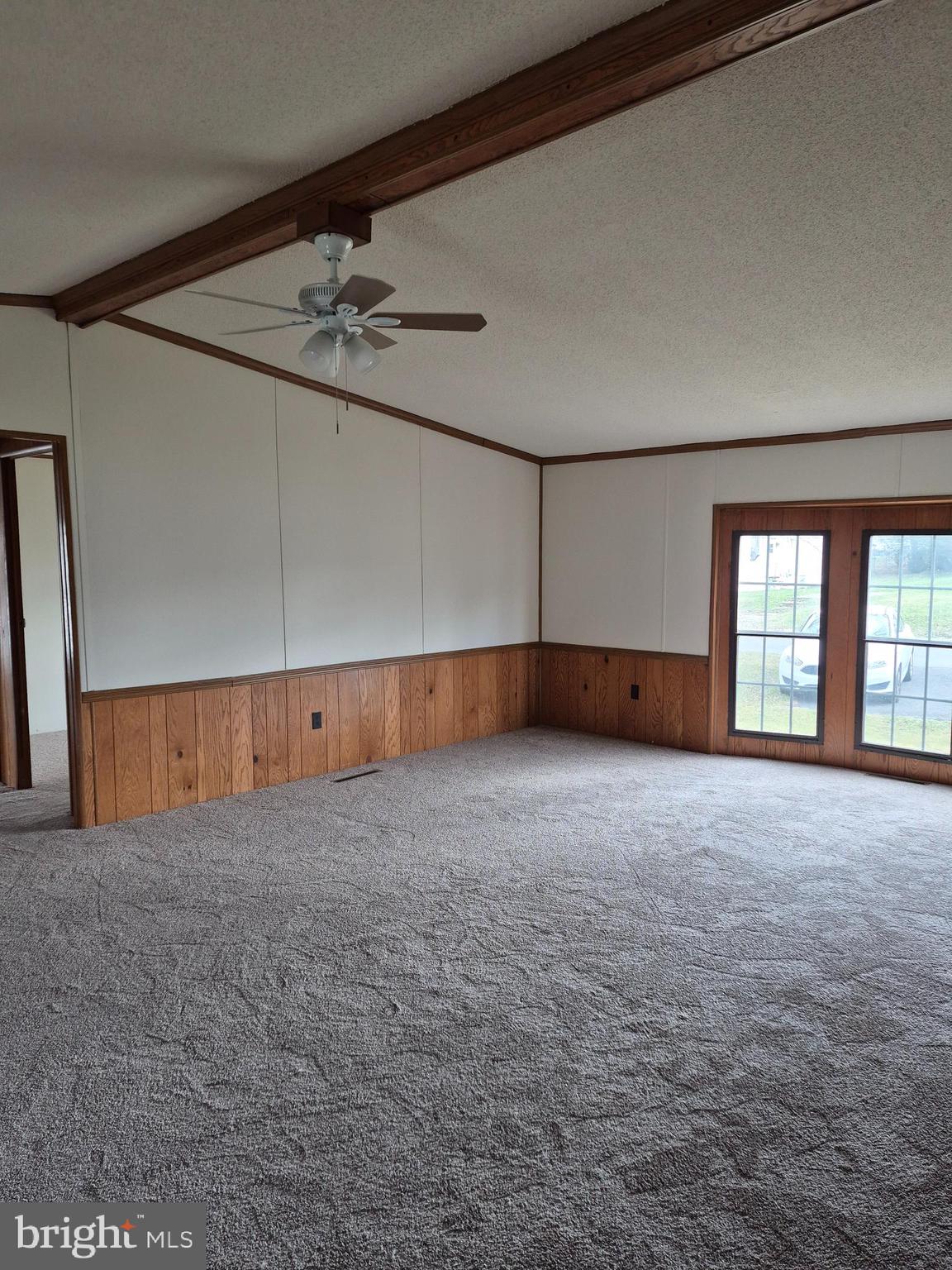 707 Cleaver Farm Road, Unit 707 Middletown, DE 19709 - Photo 6 of 15 a view of an empty room with a window