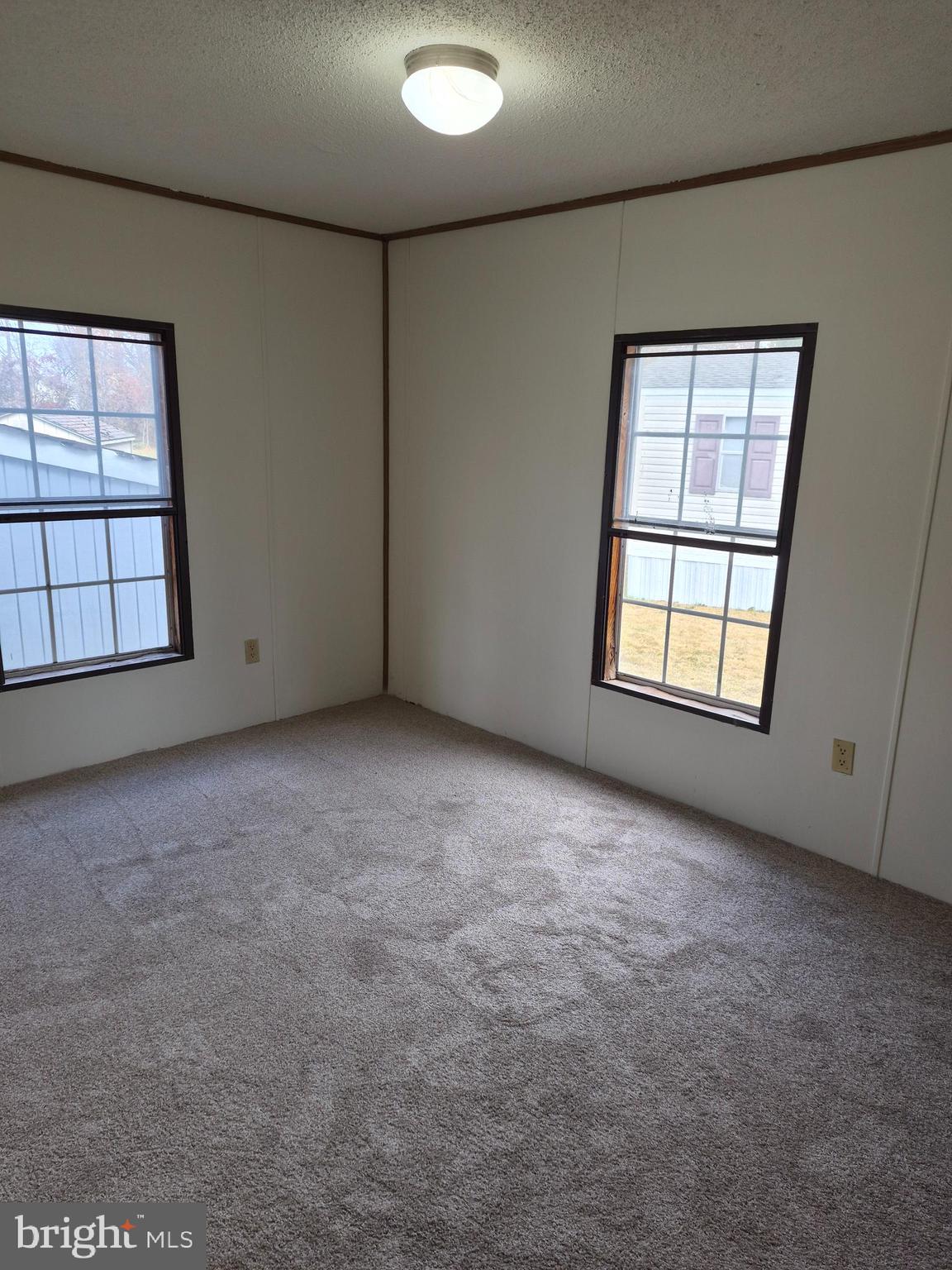 707 Cleaver Farm Road, Unit 707 Middletown, DE 19709 - Photo 10 of 15 an empty room with windows