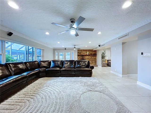 a kitchen with stainless steel appliances granite countertop a refrigerator and stove