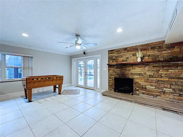 a kitchen with granite countertop a sink and cabinets