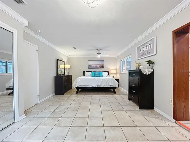 a spacious bathroom with a tub and a sink