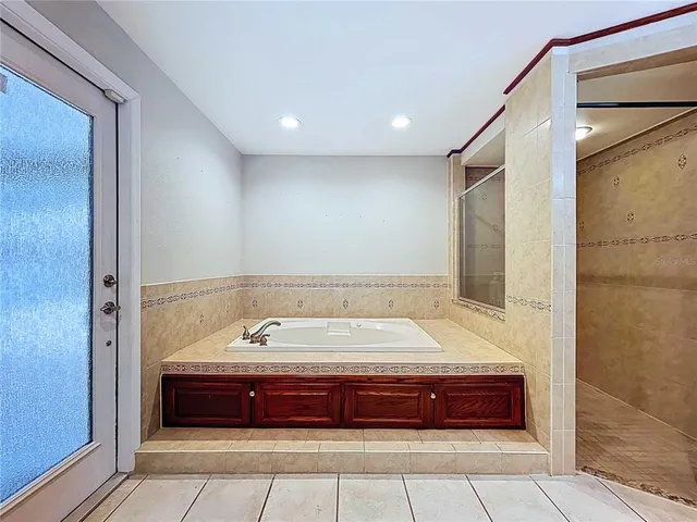 a view of a terrace with sitting area