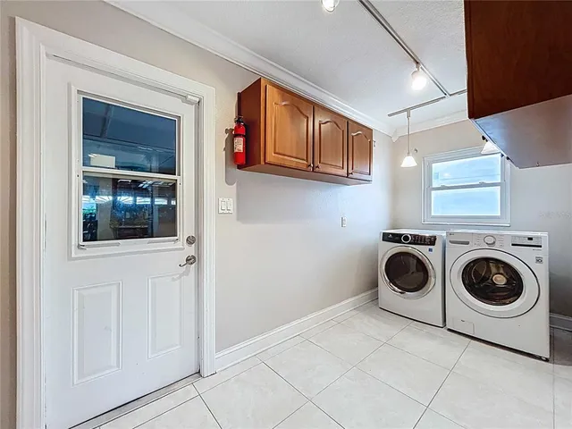 an aerial view of a house with outdoor space