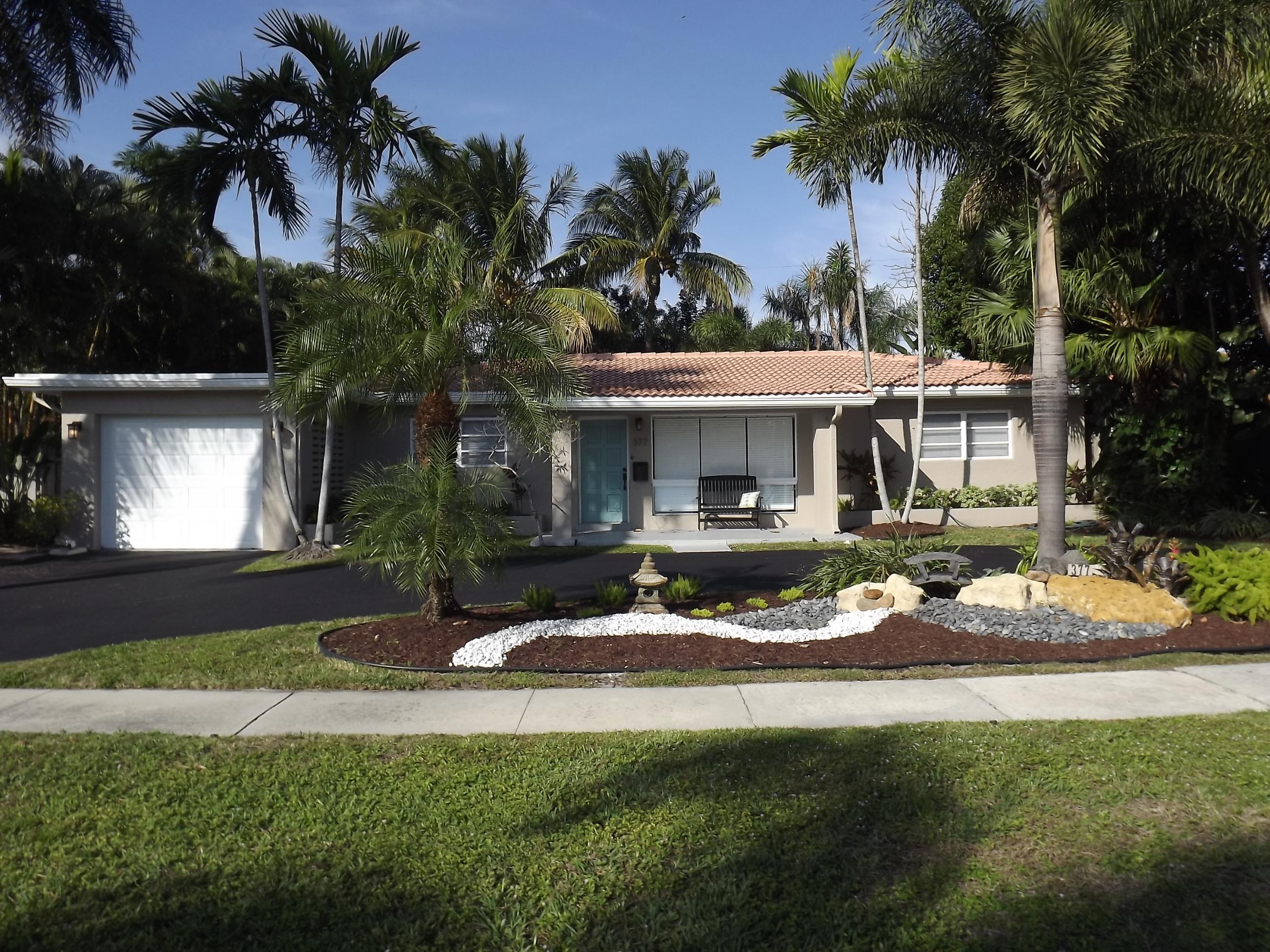 377 Northeast 24th Street Boca Raton, FL 33431 - Photo 1 of 20 EXTERIOR OF HOUSE