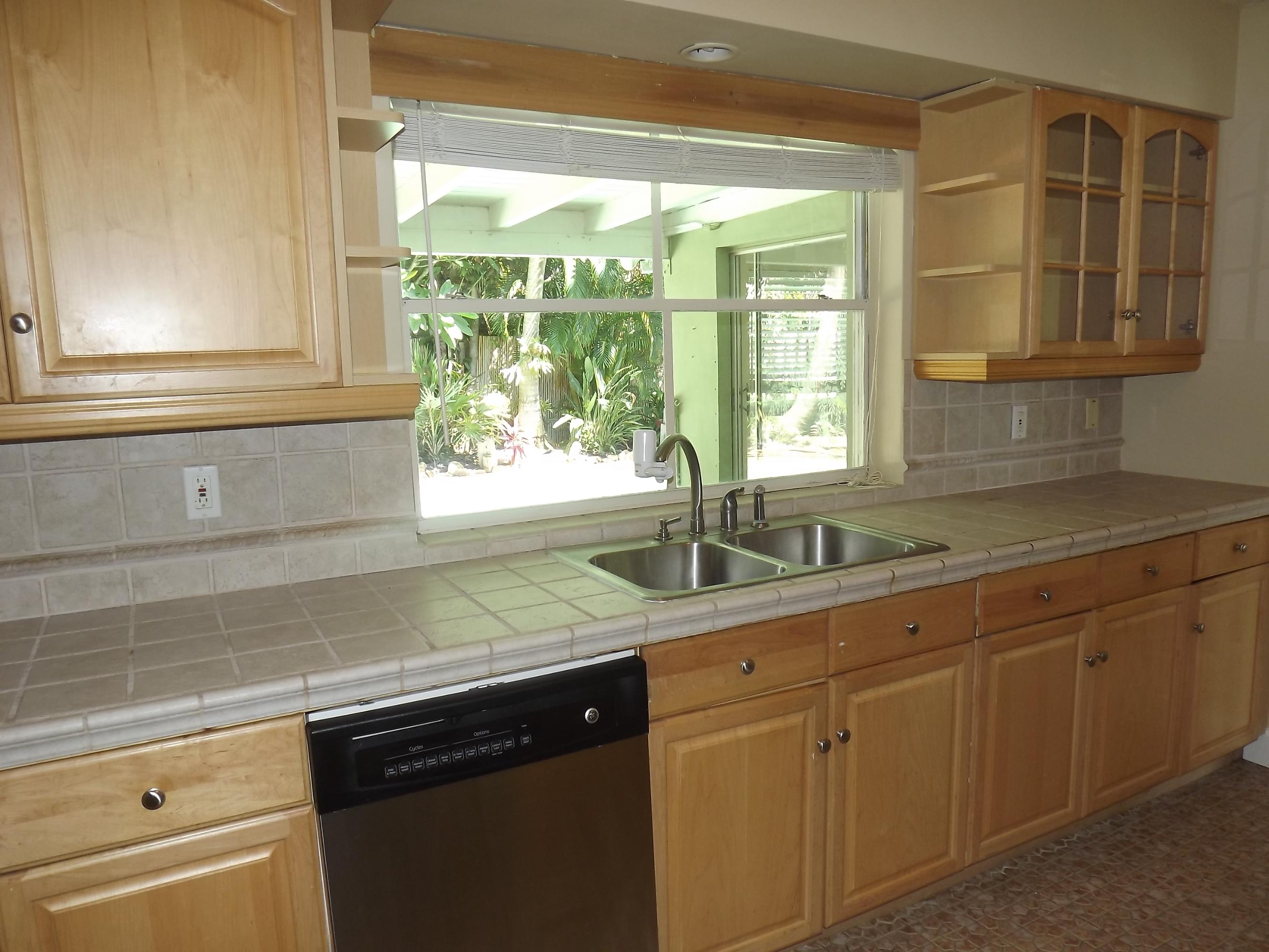 377 Northeast 24th Street Boca Raton, FL 33431 - Photo 3 of 20 Kitchen with Pool view