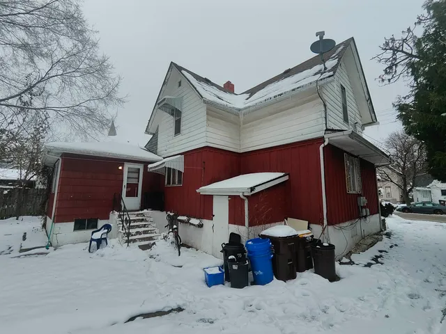 a front view of a house with patio