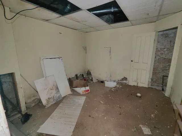 a bed room with a bed and a couch