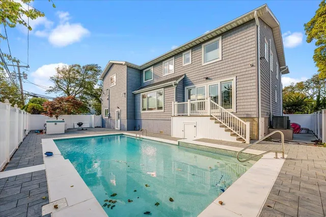 a view of backyard with tree