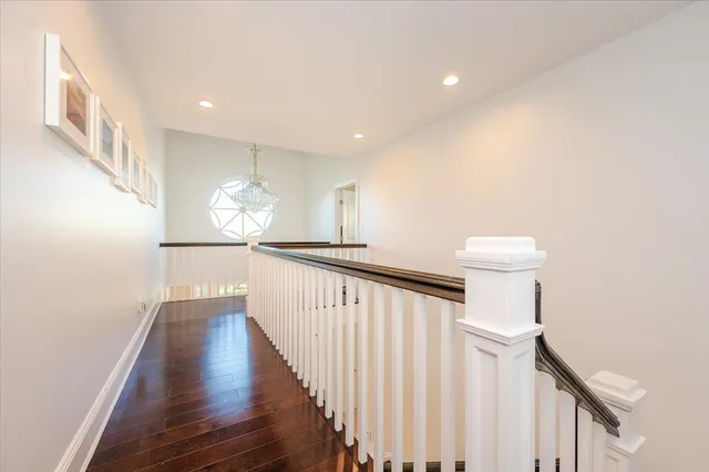 a view of entryway with wooden floor