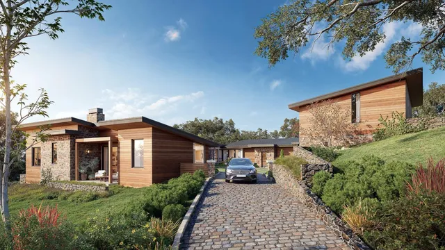 a front view of a house with garden