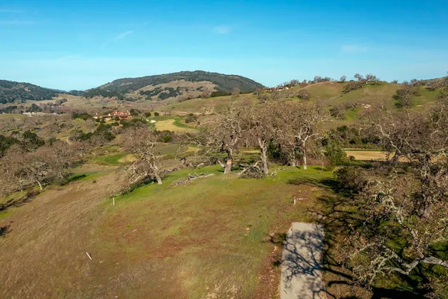 a view of an ocean and mountain