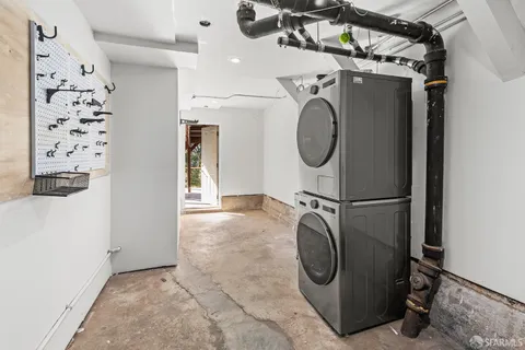 a bedroom with a bed and a chair