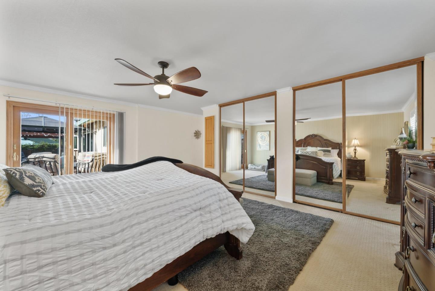 1664 Corte De Pons San Jose, CA 95124 - Photo 15 of 39 a bedroom with a large bed and a large window