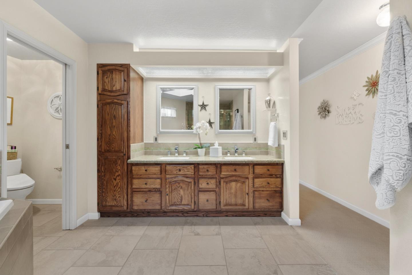 1664 Corte De Pons San Jose, CA 95124 - Photo 18 of 39 a spacious bathroom with a granite countertop sink a mirror and a bathtub