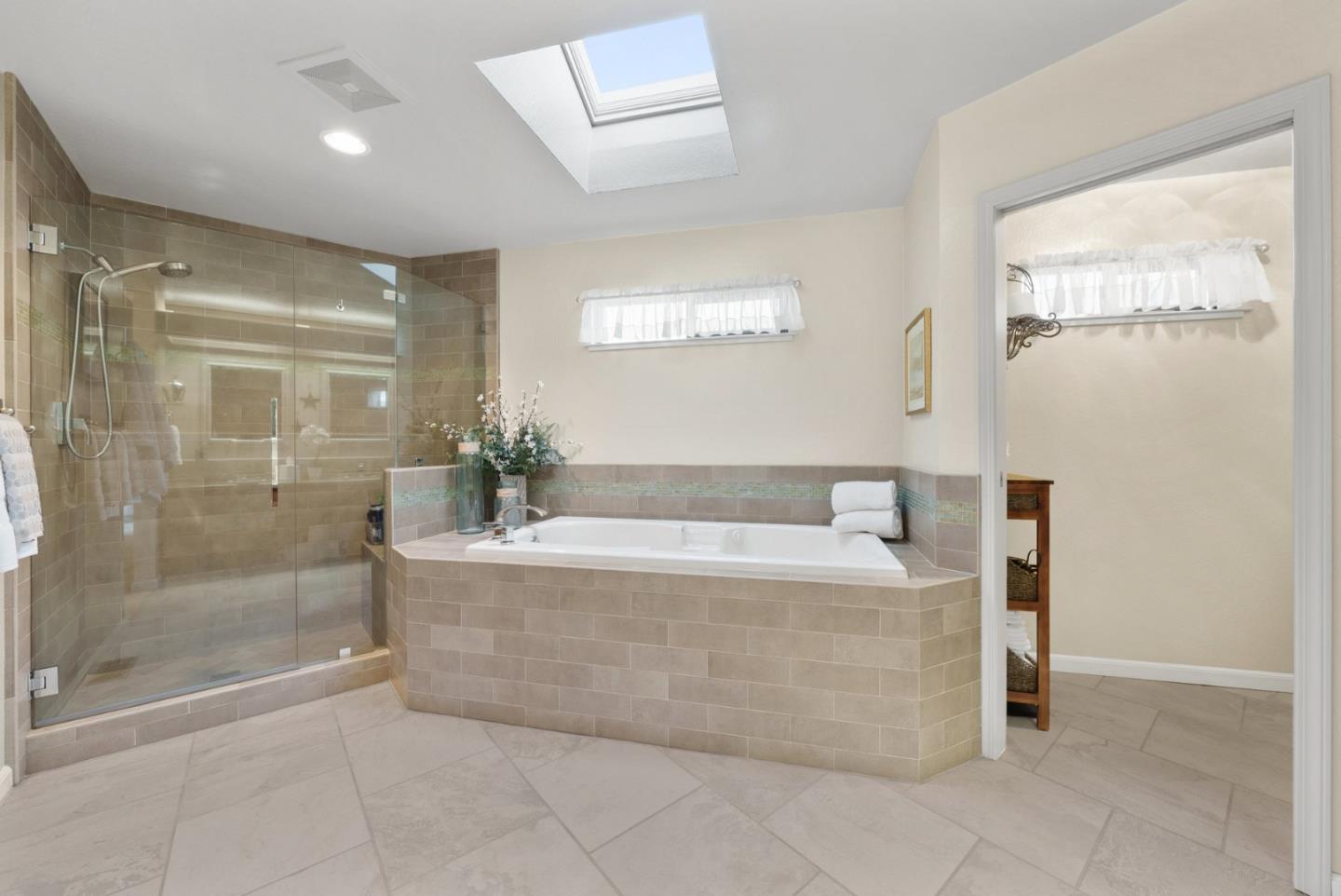 1664 Corte De Pons San Jose, CA 95124 - Photo 19 of 39 a spacious bathroom with a tub shower and mirror