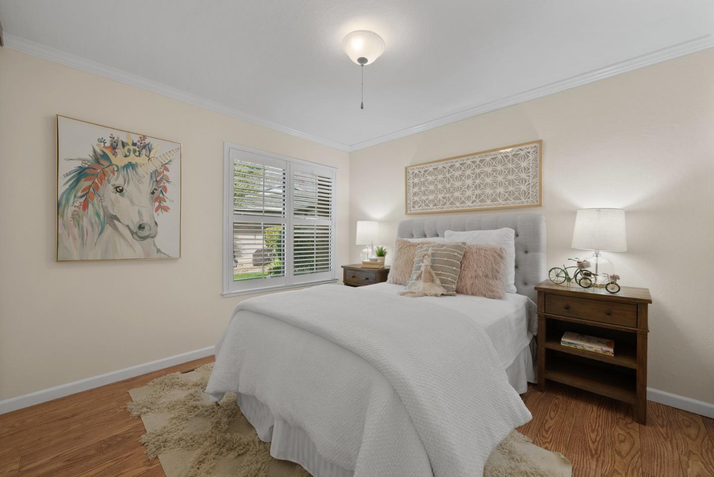 1664 Corte De Pons San Jose, CA 95124 - Photo 23 of 39 a bedroom with a bed and a wall painting
