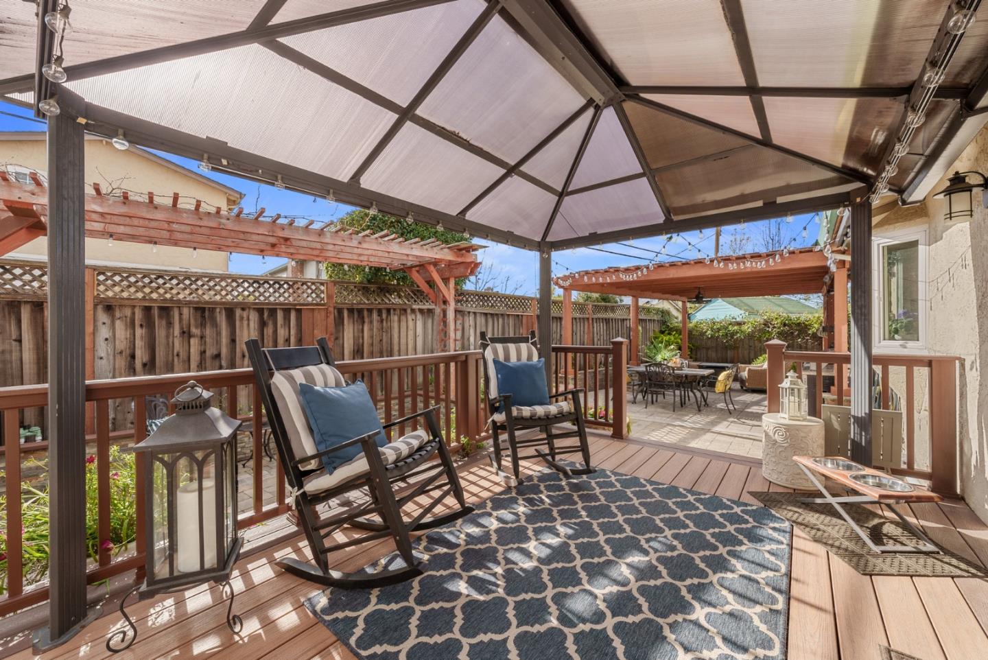 1664 Corte De Pons San Jose, CA 95124 - Photo 28 of 39 a patio with glass top table and chairs