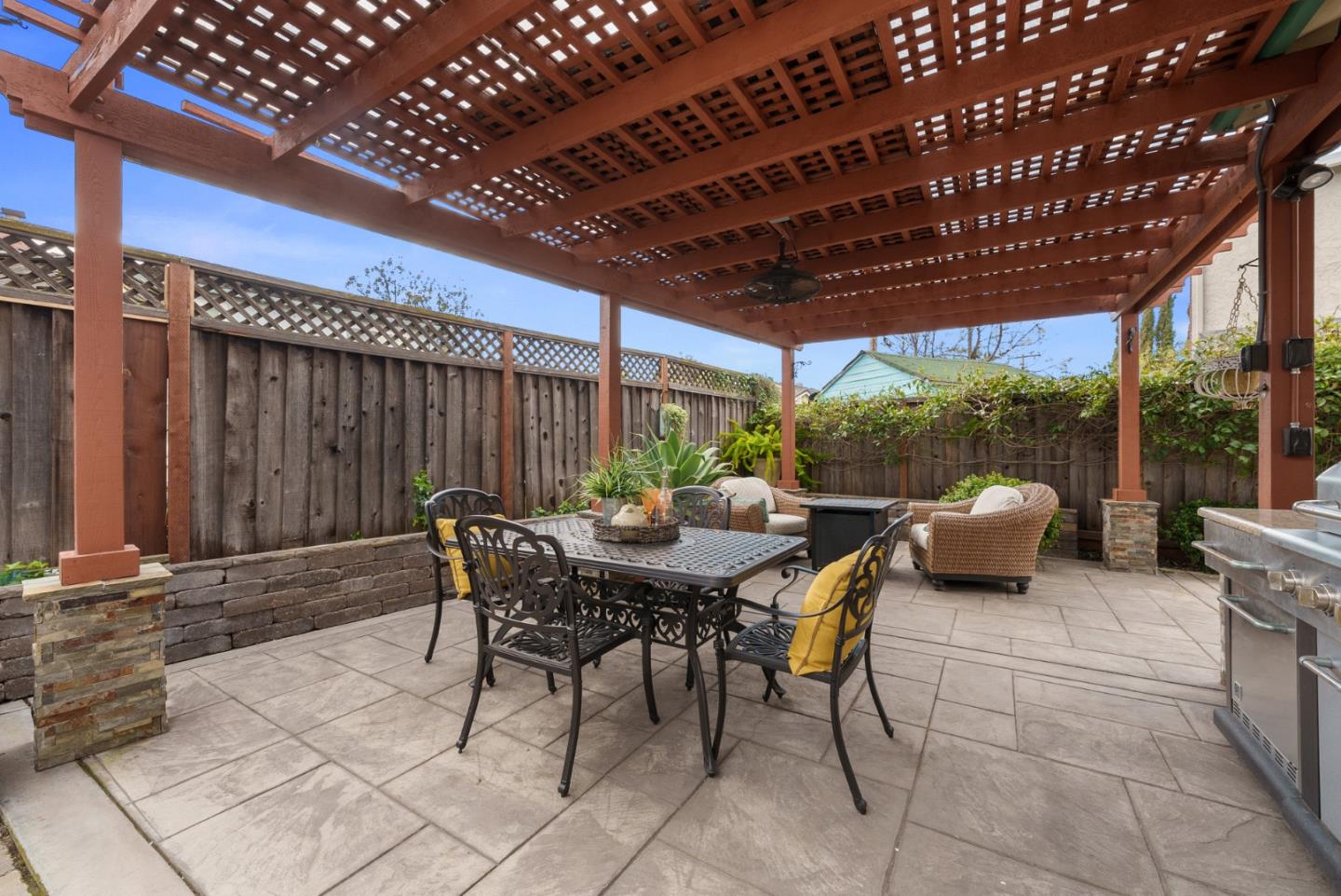 1664 Corte De Pons San Jose, CA 95124 - Photo 30 of 39 a backyard of a house with table and chairs