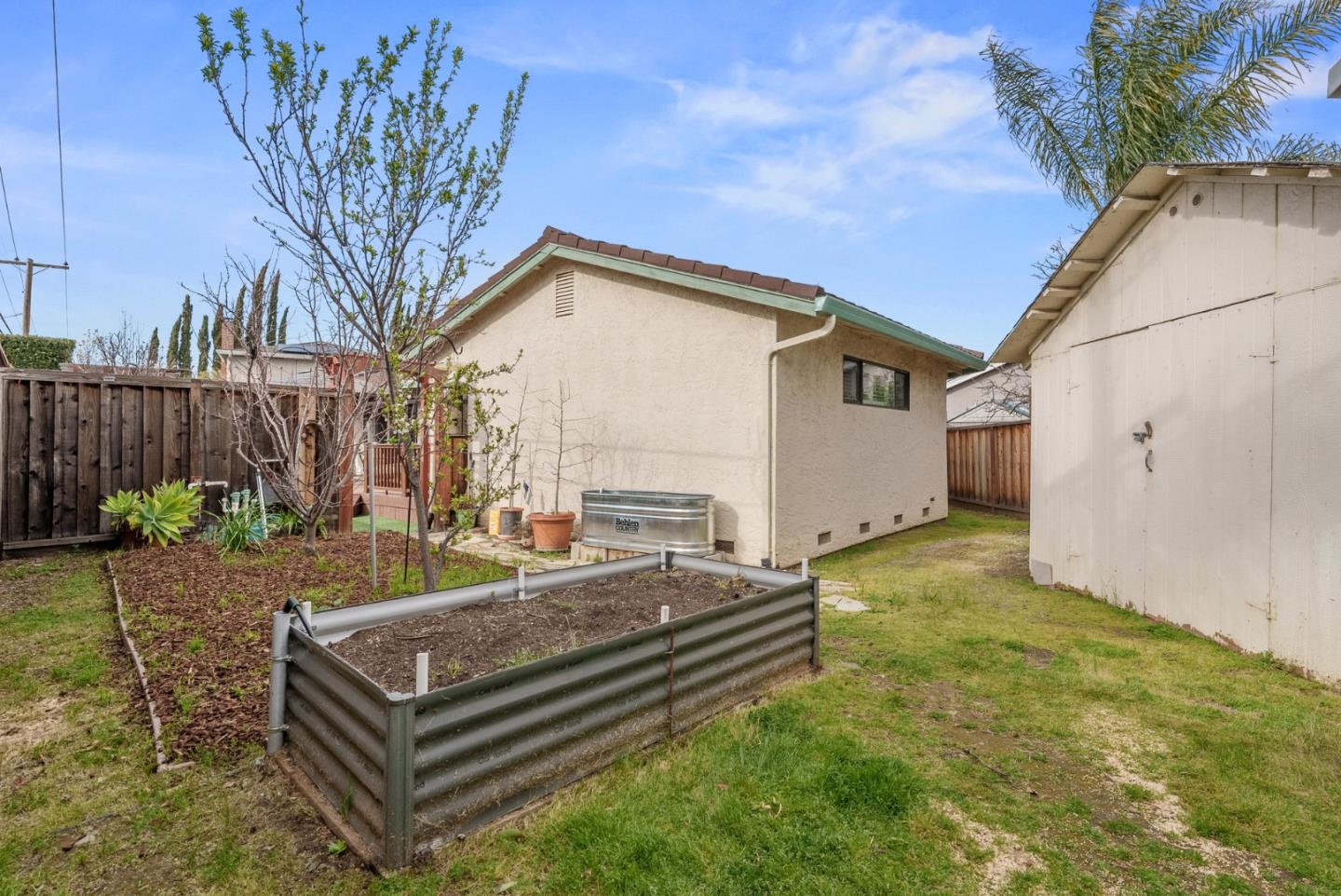 1664 Corte De Pons San Jose, CA 95124 - Photo 36 of 39 a view of a backyard with chairs and a fire pit