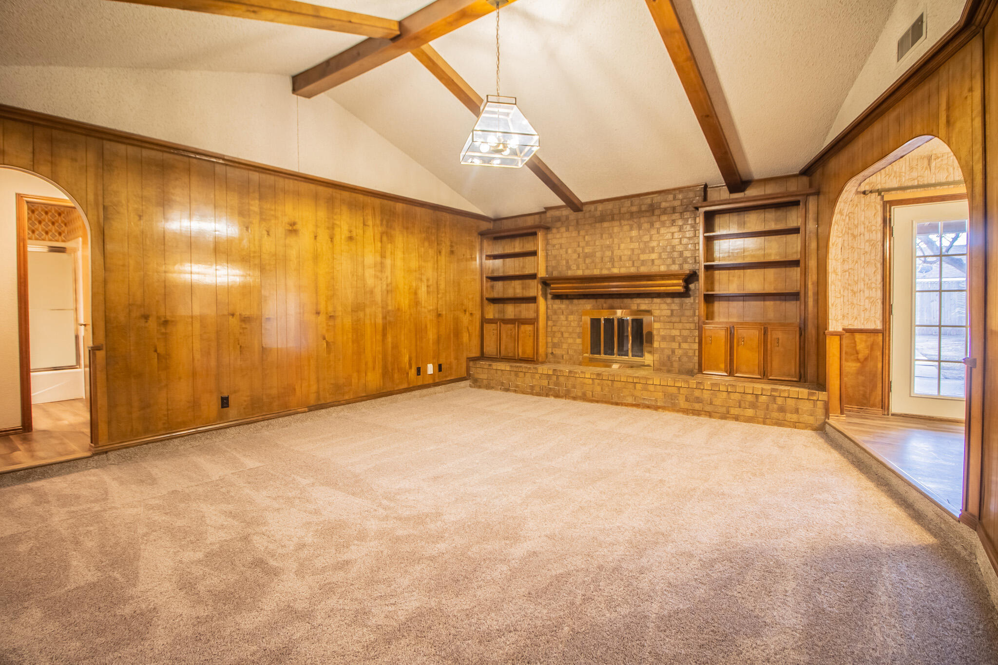 3503 91st Street Lubbock, TX 79423 - Photo 5 of 23 an empty room with windows