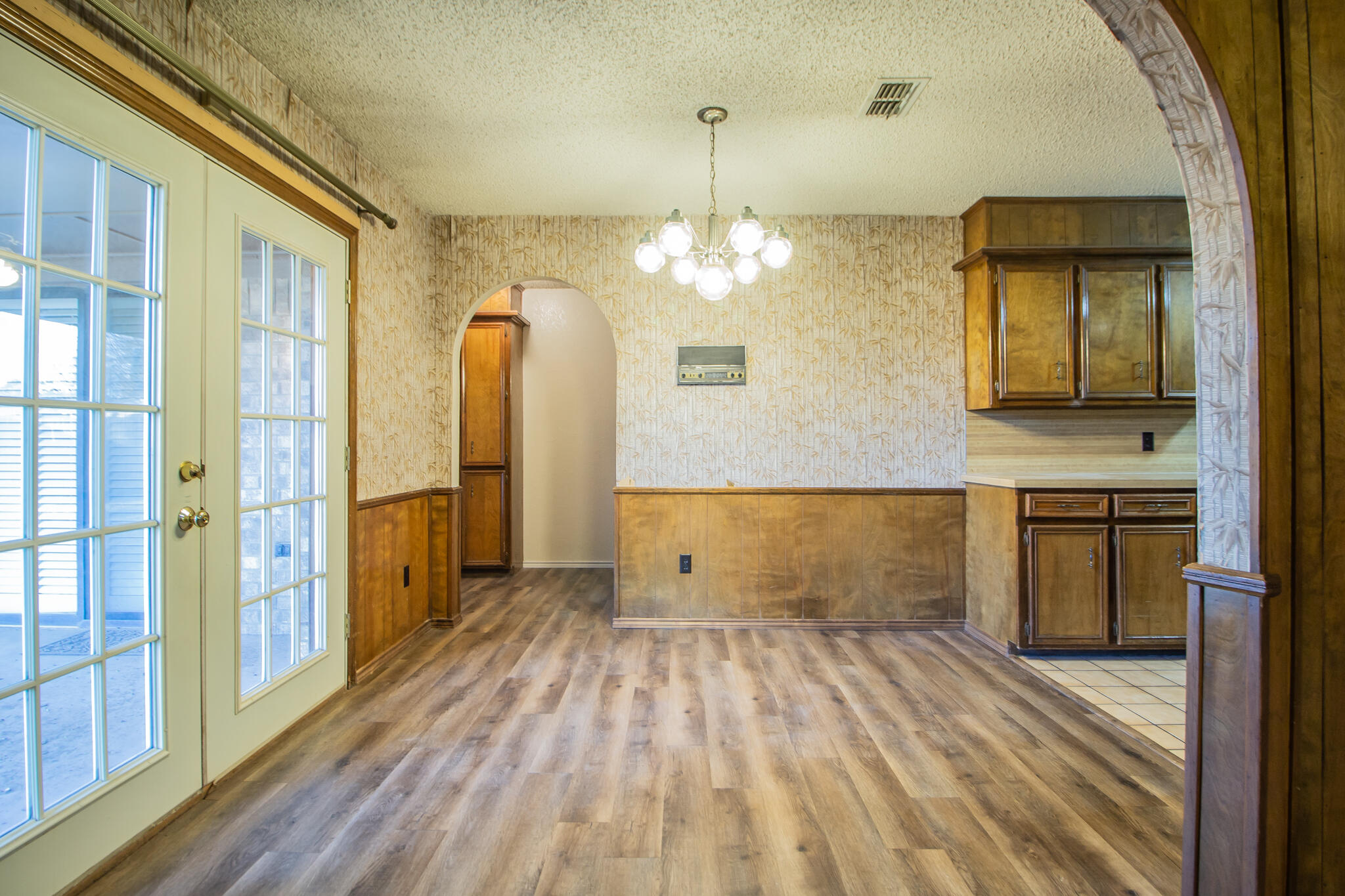 3503 91st Street Lubbock, TX 79423 - Photo 6 of 23 a spacious bathroom with a double vanity sink and a mirror