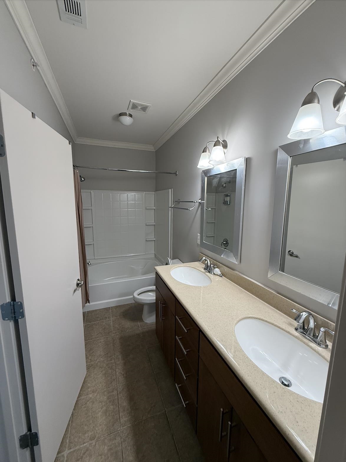 379 Cobalt Bay Loop, Unit 304 Memphis, TN 38103 - Photo 10 of 24 Bathroom featuring double vanity and bathtub