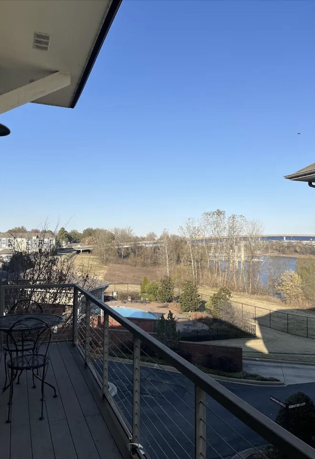 379 Cobalt Bay Loop, Unit 304 Memphis, TN 38103 - Photo 19 of 24 a view of a city from a balcony with seating space