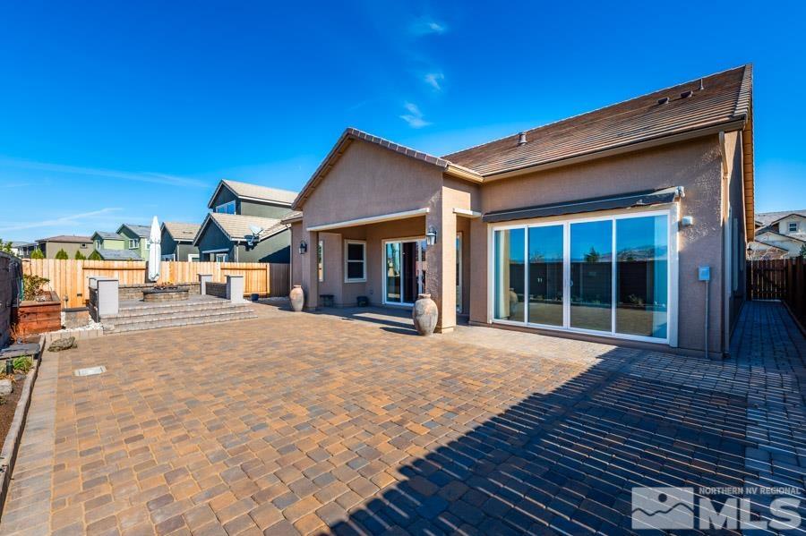 9405 Stony Hill Road Reno, NV 89521 - Photo 32 of 37 a house with wooden floor in front of it