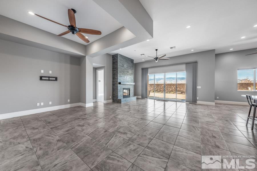 9405 Stony Hill Road Reno, NV 89521 - Photo 5 of 37 a view of an empty room with a window