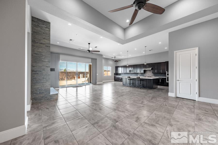 9405 Stony Hill Road Reno, NV 89521 - Photo 6 of 37 a view of a kitchen with a sink and cabinets