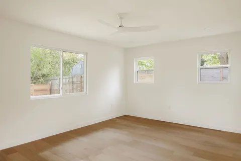 an empty room with windows