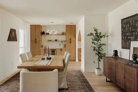 a view of a dining room with furniture