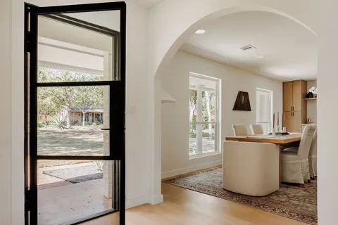 a kitchen with a sink and a window