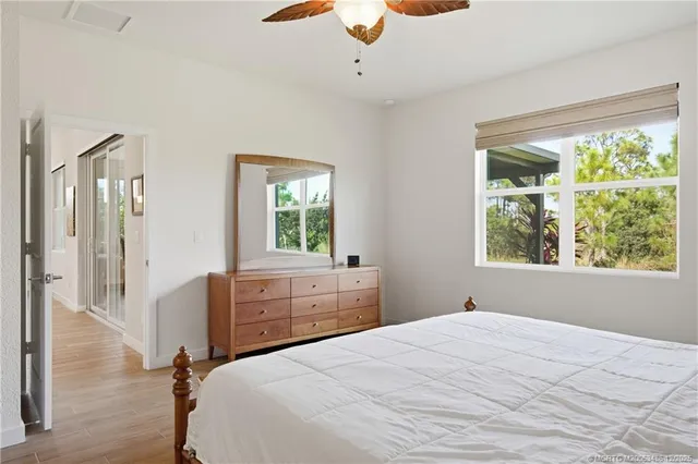 a bathroom with a double vanity sink and mirror