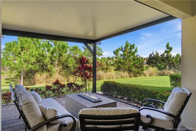 a outdoor living space with furniture and garden view