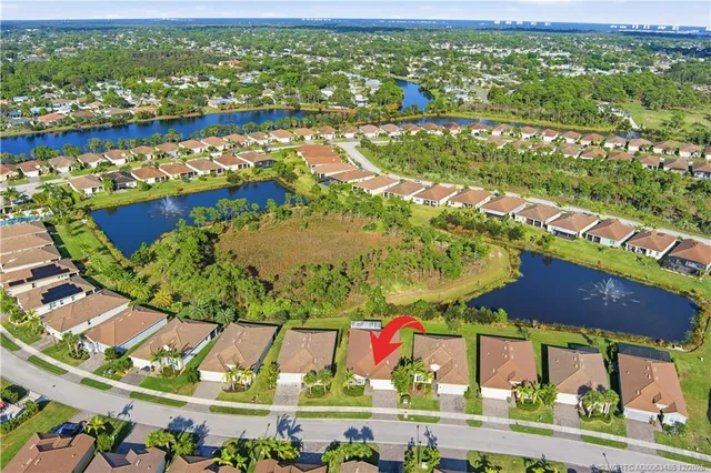 an aerial view of a house with a garden