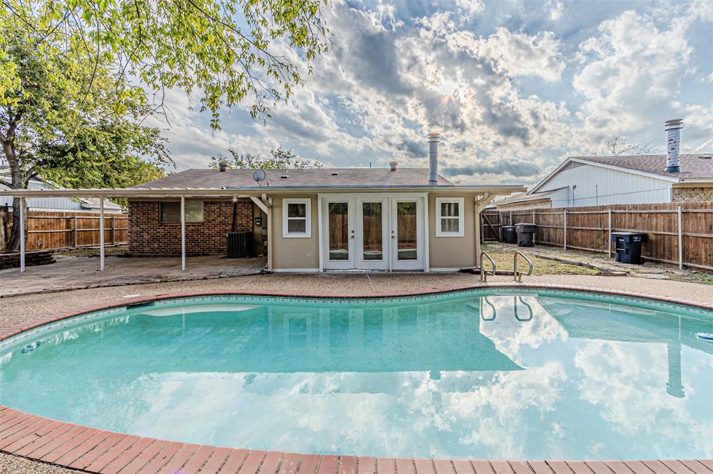 a view of a house with a swimming pool