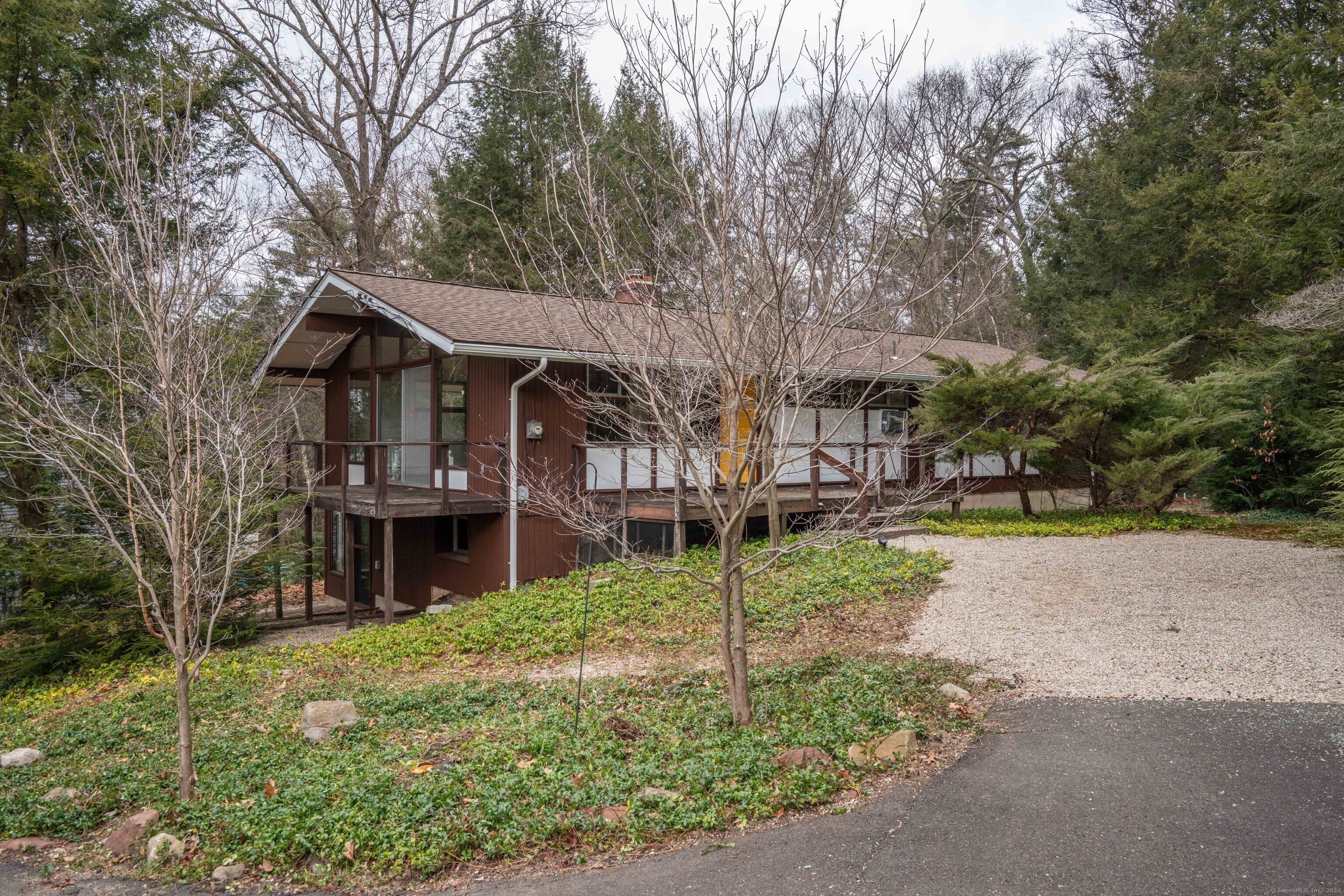 596 Country Club Road Avon, CT 06001 - Photo 1 of 1 Welcome home to this light-filled, mid-century modern home!